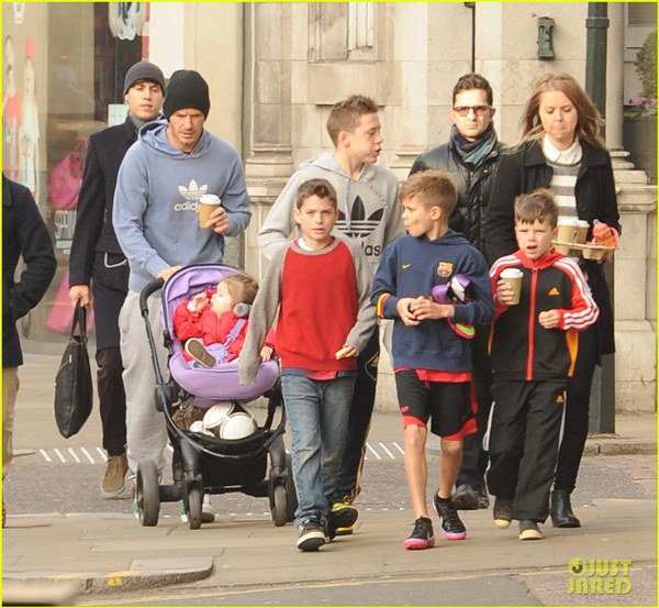 David Beckham takes his children Romeo, Brooklyn, Cruz and Harper to the park to play football