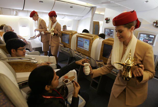 Emirates Airlines flight attendants serv